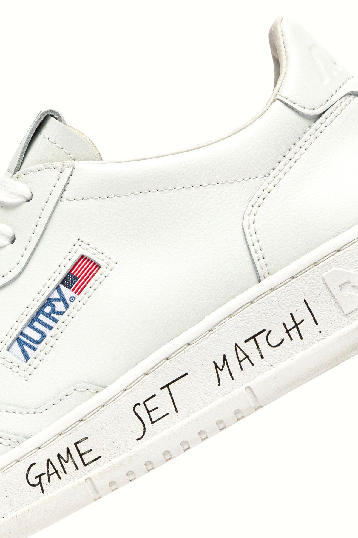 Autry Sneaker Medalist total white in pelle con lettering Game Set Match AULM ML08 TOTALWHT