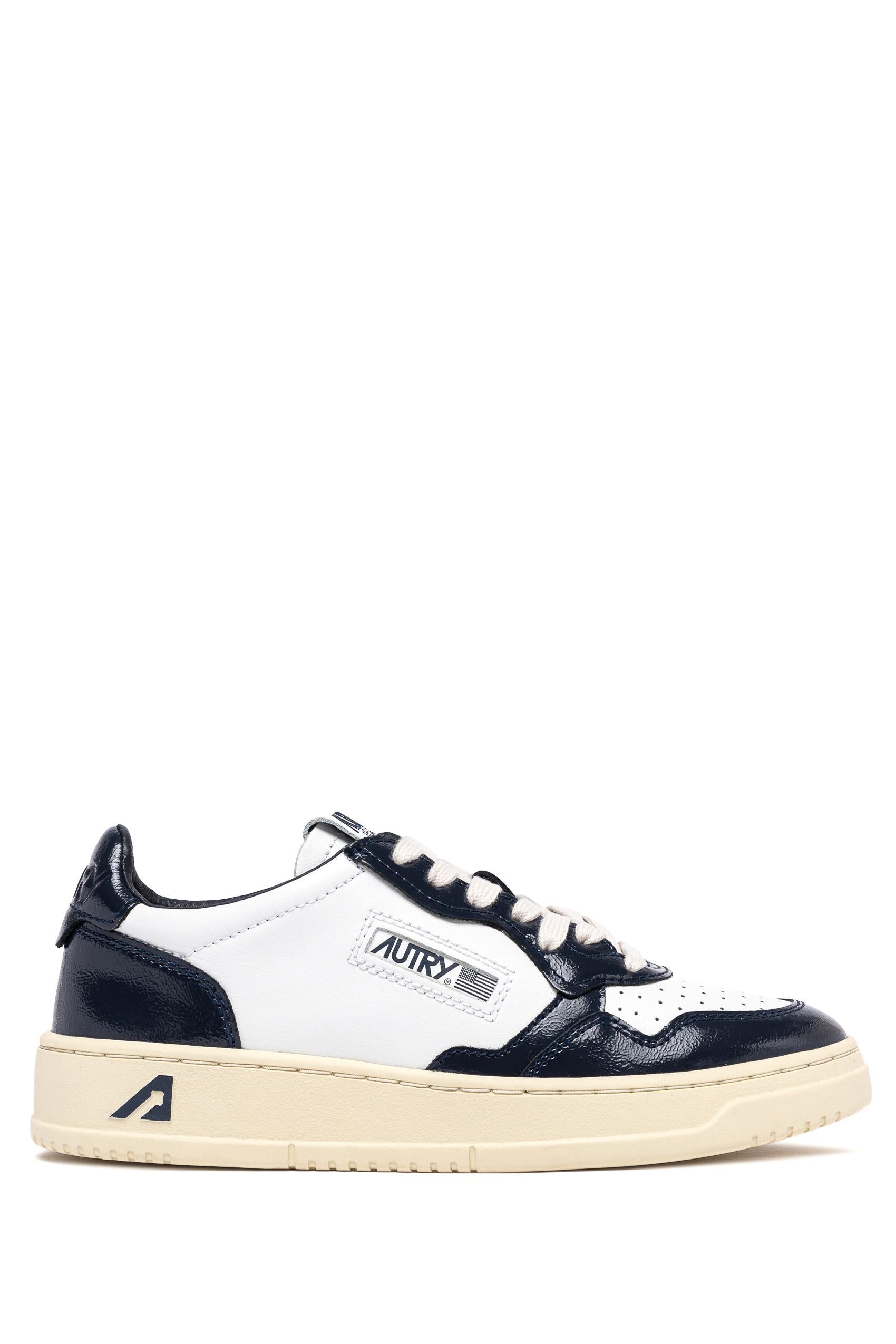 Sneaker donna bimateriale in pelle e vernice AULW RT06 WHT/NIGHT Autry