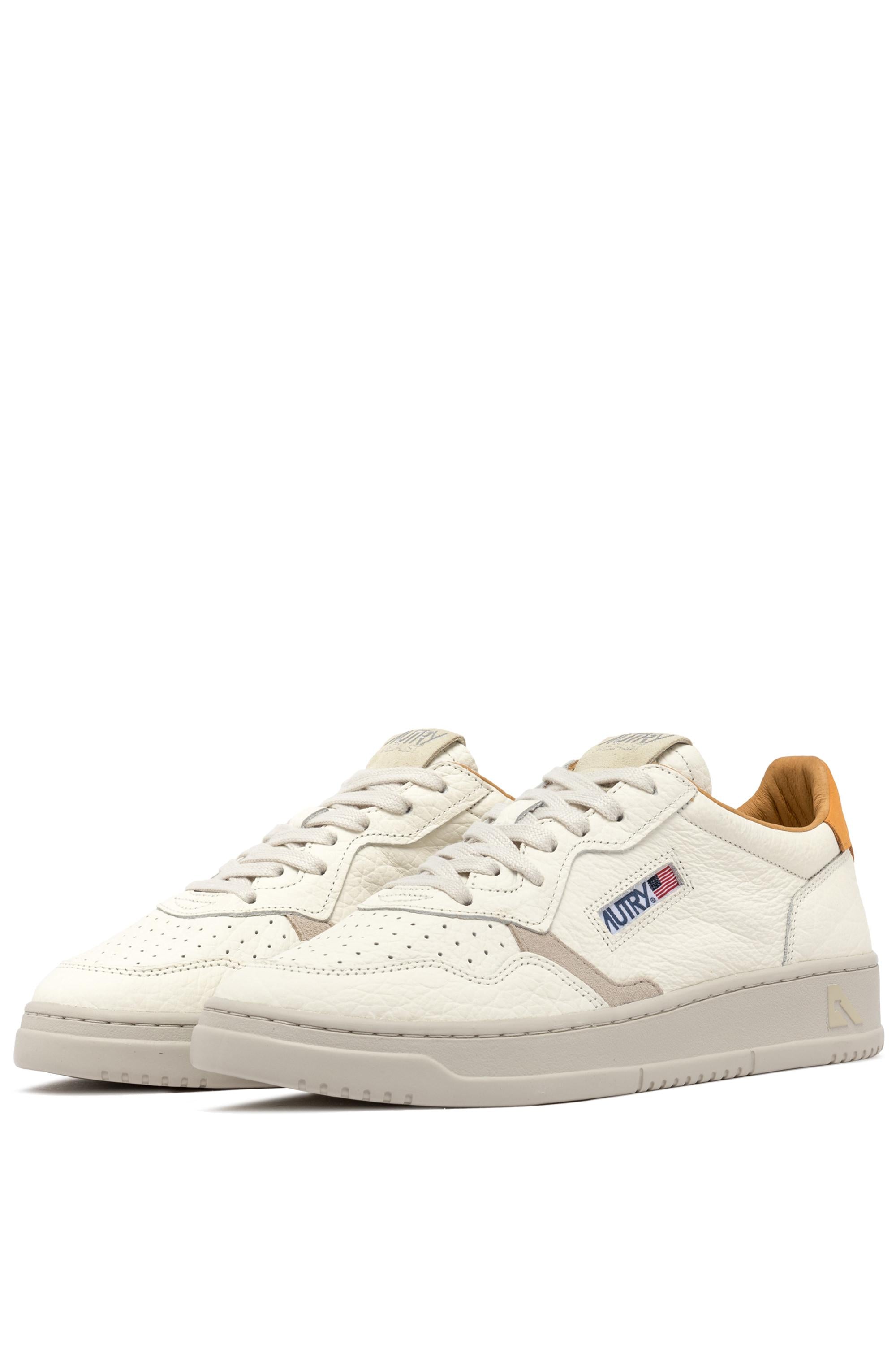 Sneaker Medalist low in pelle effetto elephant talloncino ocra AULM NE06 APR/SAND Autry