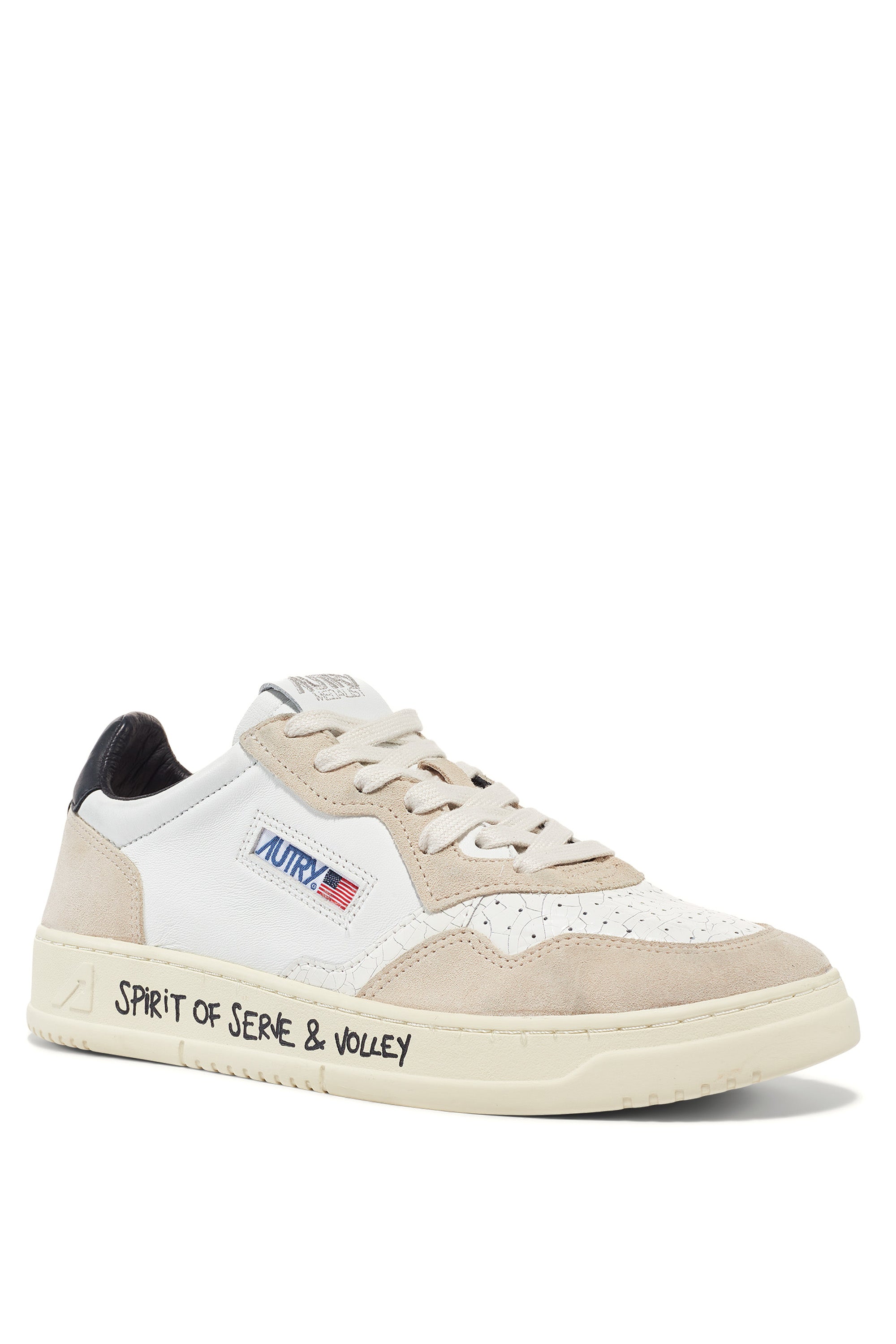 Medalist sneaker with black heel tab and writing