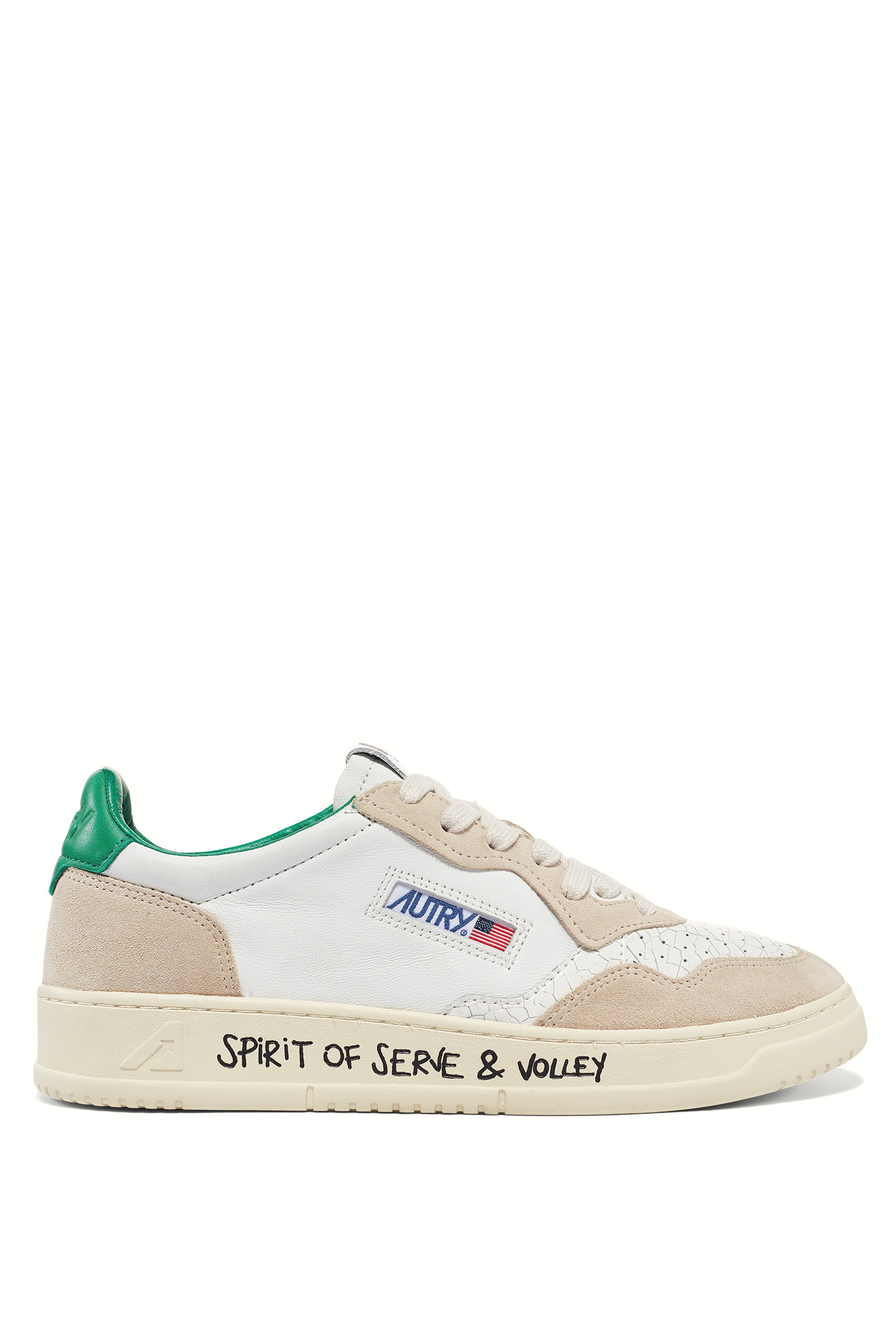Medalist sneaker with green heel tab and writing