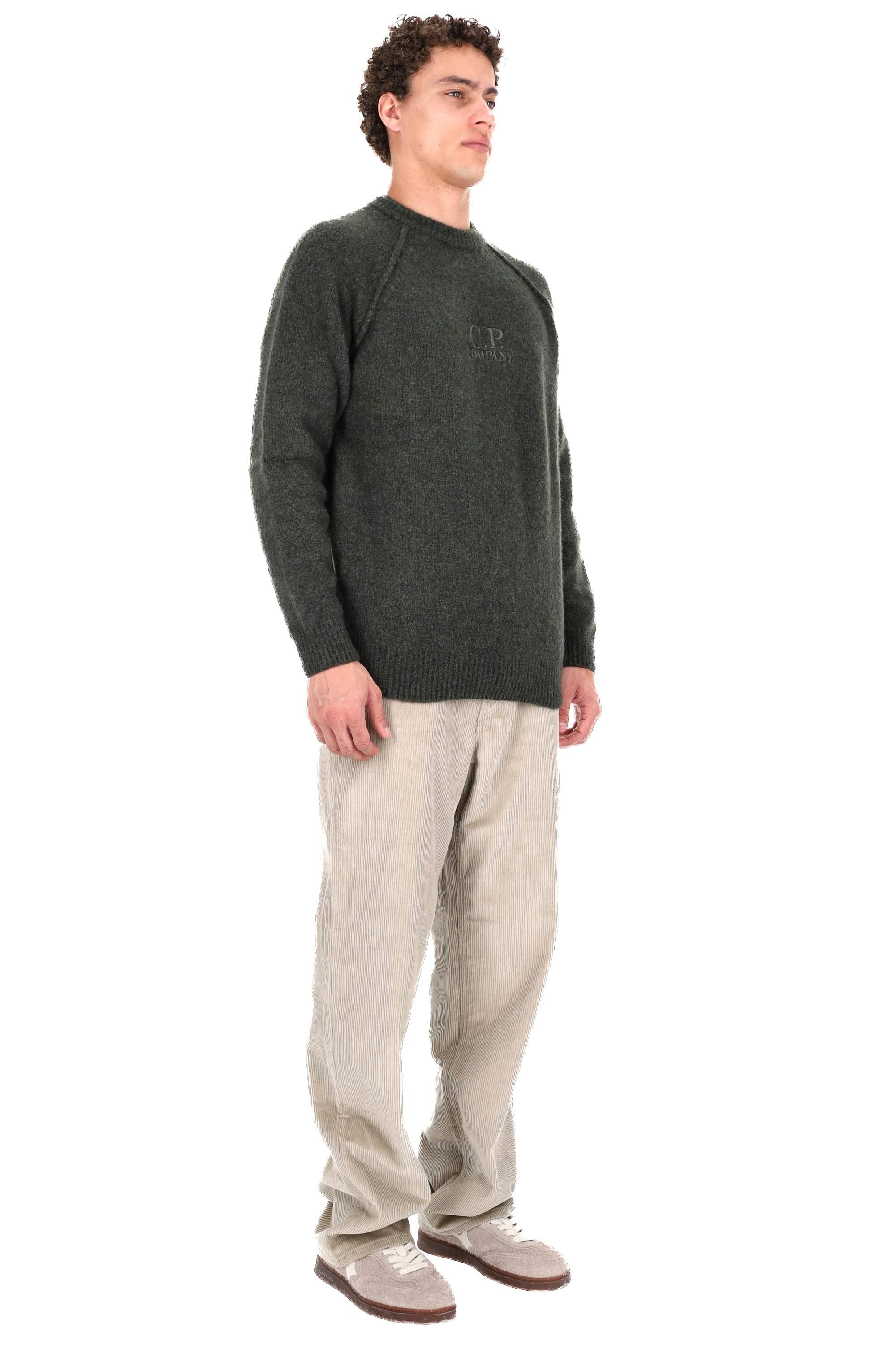 CP Company Maglia girocollo in lana con logo centrale MKN280A11-0509A 667 